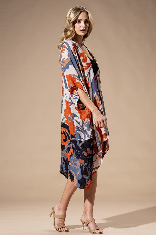 Light Weight Botanical Floral Print Kimono, open front, loose fit in shades of beige, orange, and blue