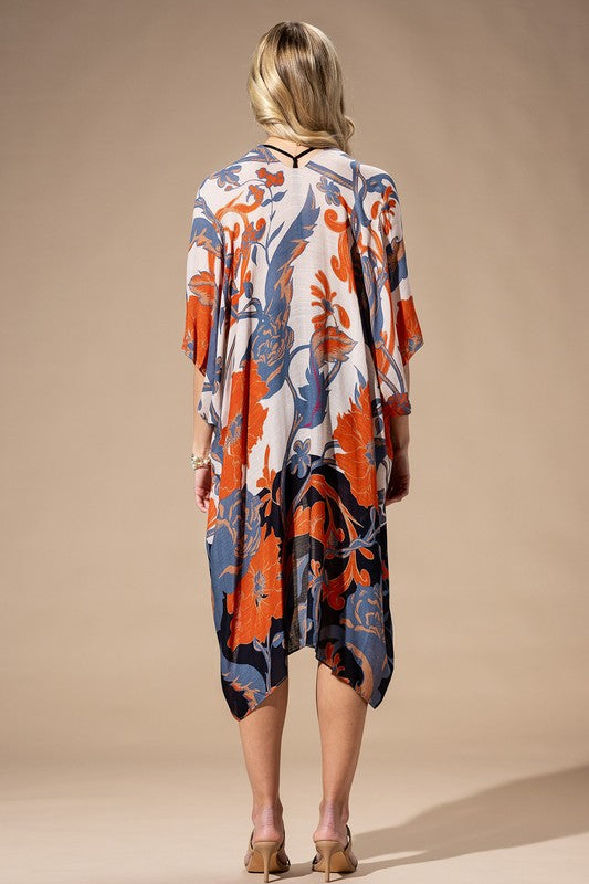 Light Weight Botanical Floral Print Kimono, open front, loose fit in shades of beige, orange, and blue