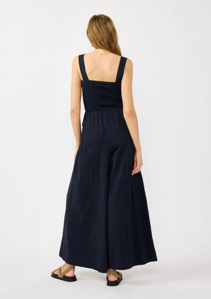 WIDE LEG SMOCKED BODICE COTTON JUMPSUIT IN DEEP NAVY WITH SIDE POCKETS