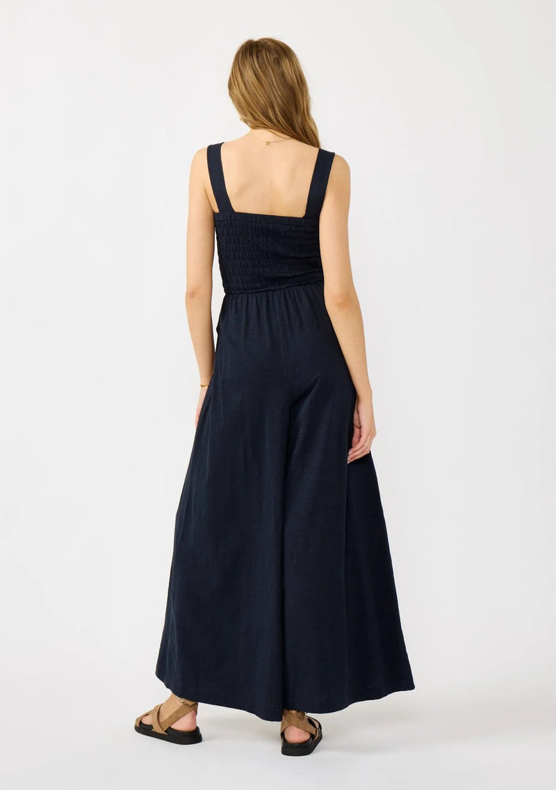 WIDE LEG SMOCKED BODICE COTTON JUMPSUIT IN DEEP NAVY WITH SIDE POCKETS