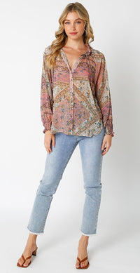 PRINT PEASANT BLOUSE in shades of mauve, cream, gold and blue with long sleeves and smocking at wrists