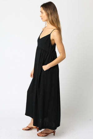 V-NECK MAXI DRESS WITH ADJUSTABLE SPAGHETTI STRAPS AND HIDDEN SIDE POCKETS IN BLACK