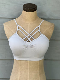 Silver bralette with criss cross front, adjustable straps and removable padding