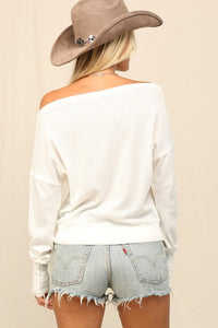 OFF-THE-SHOULDER THERMAL KNIT TOP in White with banded waistline