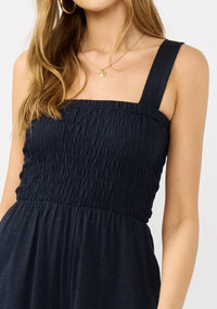WIDE LEG SMOCKED BODICE COTTON JUMPSUIT IN DEEP NAVY WITH SIDE POCKETS
