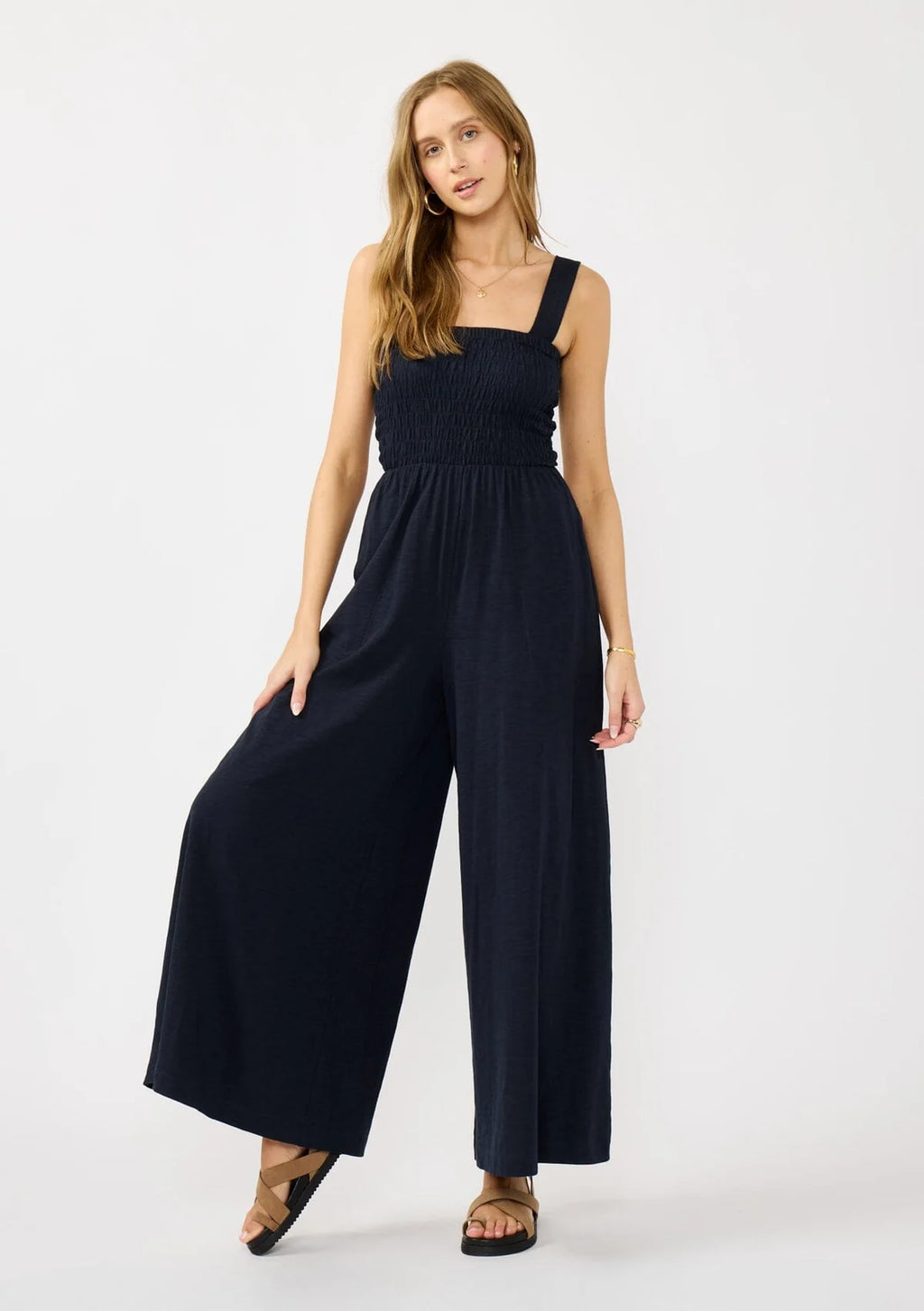 WIDE LEG SMOCKED BODICE COTTON JUMPSUIT IN DEEP NAVY WITH SIDE POCKETS
