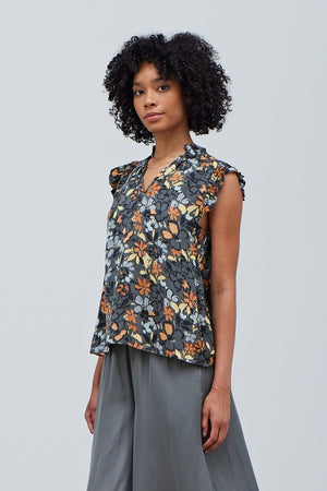 FLORAL SATIN RUFFLE SLEEVE BLOUSE on a slate background with floral print in shades of mustard, apricot and lt. gray. 