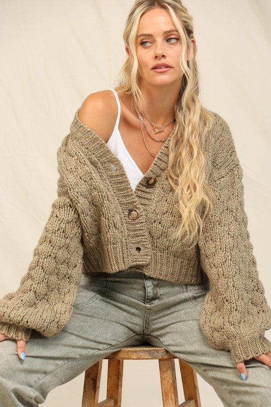 Chunky knit cardigan in Olive with balloon sleeves and button closures