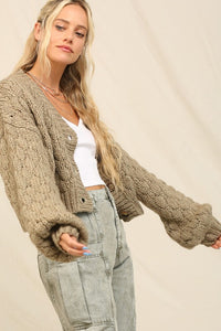 Chunky knit cardigan in Olive with balloon sleeves and button closures