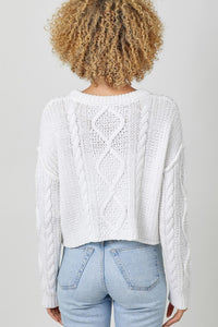 WHITE CABLE KNIT SWEATER WITH RAW EDGE HEM, ROUND NECKLINE, LONG SLEEVES