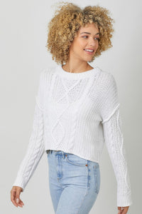 WHITE CABLE KNIT SWEATER WITH RAW EDGE HEM, ROUND NECKLINE, LONG SLEEVES