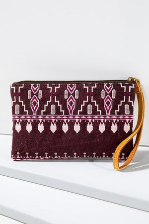 Ethnic Pattern Wristlet in shades of Fuchsia/Pink/Eggplant with gold and bronze seed beading and zipper closure