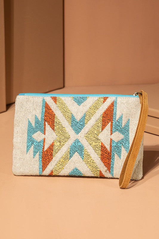 WOVEN TRIBAL PATTERN WRISTLET IN SHADES OF NATURAL, TURQUOISE, RUST WITH ZIPPER CLOSURE
