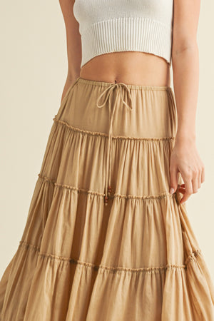 Tiered Full-Length Maxi Skirt
Elastic Waistband
Beaded Drawstring Tie Waist
Lined to Knee, Not Sheer