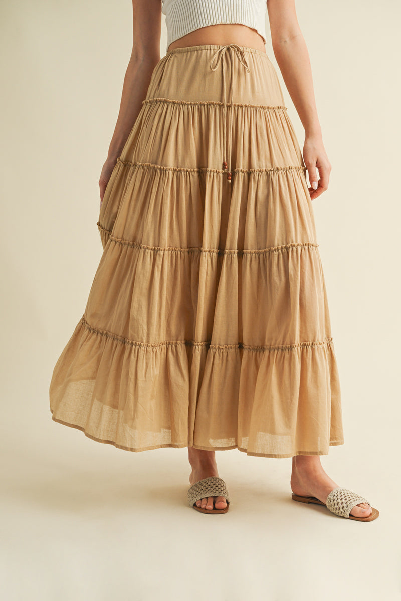 Tiered Full-Length Maxi Skirt
Elastic Waistband
Beaded Drawstring Tie Waist
Lined to Knee, Not Sheer