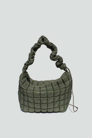 Washed Army Green nylon quilted crossbody bag with adjustable drawstring strap, zipper closure and interior wall pockets. 