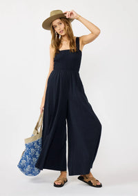 WIDE LEG SMOCKED BODICE COTTON JUMPSUIT IN DEEP NAVY WITH SIDE POCKETS