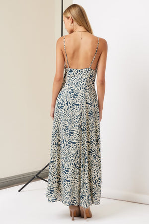 Maxi Dress in Abstract Navy and Beige Floral Print
V-Neckline
Invisible Side Zipper

Hidden Side Pockets
Adjustable Spaghetti Straps
Fully Lined