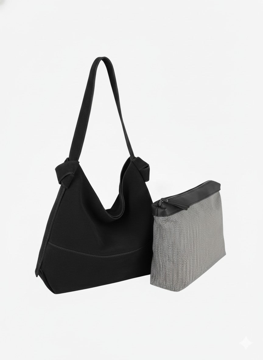 Genuine suede hobo style bag in black with large, removable zipper pouch, and suede shoulder strap