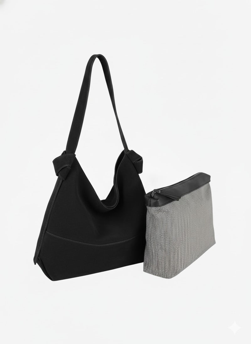 Genuine suede hobo style bag in black with large, removable zipper pouch, and suede shoulder strap