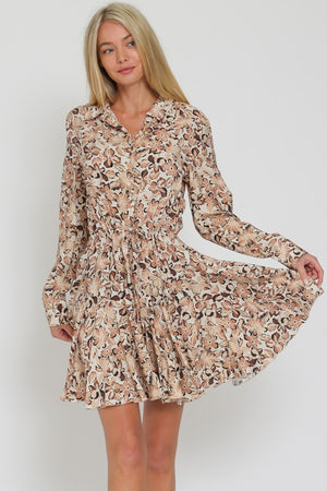 LONG SLEEVED FLORAL FLIRTY SKIRT MINI DRESS IN A FLORAL PRETTY IN SHADES OF BROWN AND BEIGE.  DRAWSTRING TIE AT WAIST.