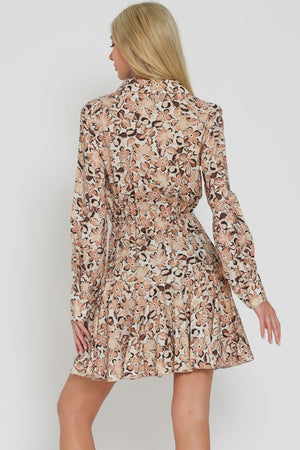 LONG SLEEVED FLORAL FLIRTY SKIRT MINI DRESS IN A FLORAL PRETTY IN SHADES OF BROWN AND BEIGE.  DRAWSTRING TIE AT WAIST.