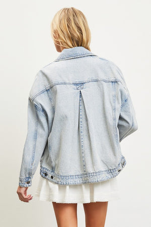 100% cotton, slightly oversized denim jacket in vintage light blue with five buttons up front, straight collar, front patch pockets and side pockets, pleated back with adjustable waist closures and button wrist closures