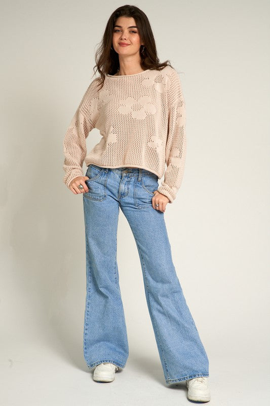 Beige flower pattern crochet sweater with rolled edge at neckline, sleeves and waist