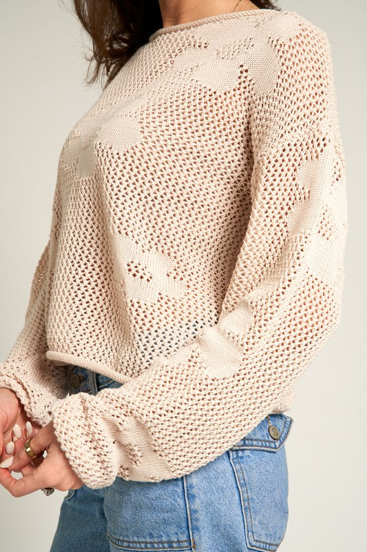 Beige flower pattern crochet sweater with rolled edge at neckline, sleeves and waist