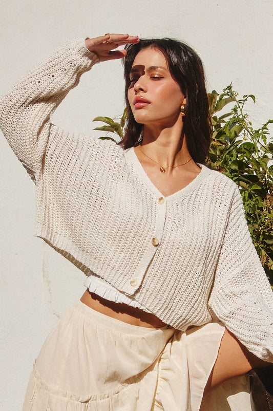 BOXY CROPPED CARDIGAN IN IVORY WITH FUNCTIONAL BUTTON CLOSURES