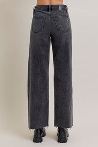Black wide-leg jeans on a plain background, wide leg, full-length, raw edge hem