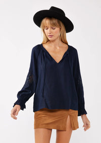 navy embroidered lace trim ruffle blouse, long sleeves with ruffled elastic wrist cuff