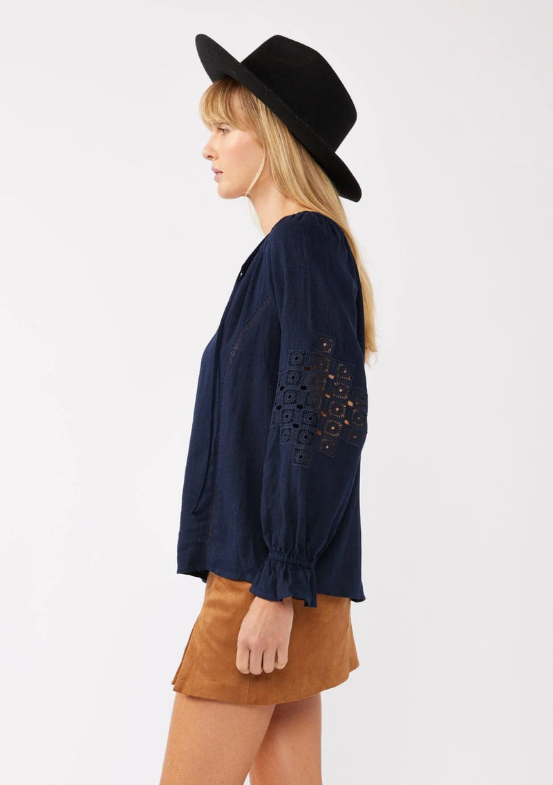 navy embroidered lace trim ruffle blouse, long sleeves with ruffled elastic wrist cuff