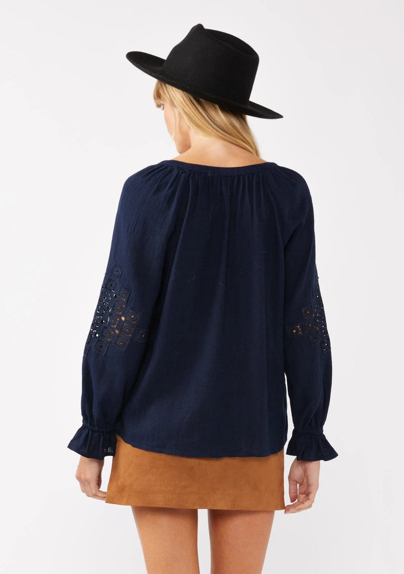 navy embroidered lace trim ruffle blouse, long sleeves with ruffled elastic wrist cuff