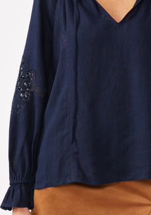 navy embroidered lace trim ruffle blouse, long sleeves with ruffled elastic wrist cuff