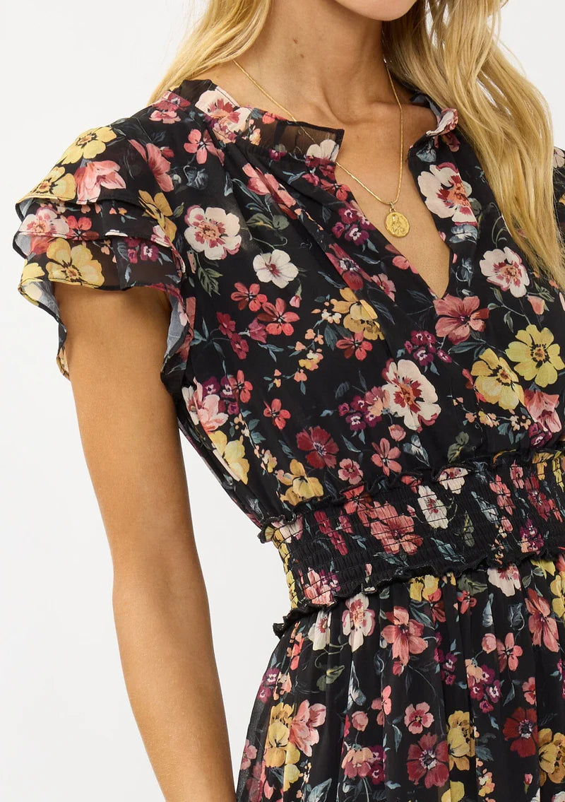 floral print maxi dress with front slit, ruffle short sleeves, contrast floral print on bottom, V-neck, smocked waist band, color is black with rose, ivory and green flower print. 