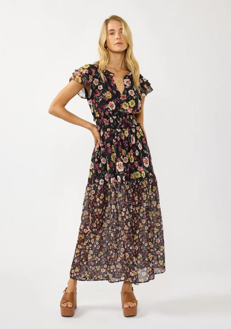 floral print maxi dress with front slit, ruffle short sleeves, contrast floral print on bottom, V-neck, smocked waist band, color is black with rose, ivory and green flower print. 