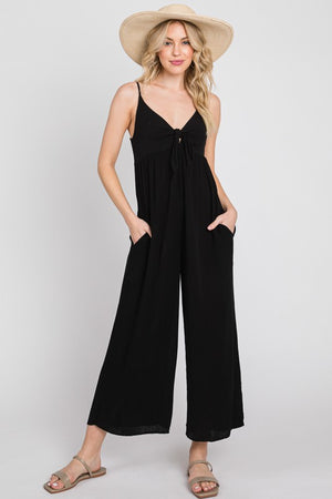 black gauze jumpsuit with side pockets, front tie key-hole, just above ankle length, and spaghetti straps
