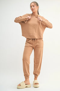 Loose-fit hoodie sweater made from durable 100% cotton with a big drawcord and raw-edge hem