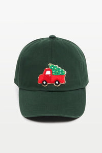 Baseball cap with a chenille patch depicting an adorned Christmas Tree in a Vintage Truck in dark green