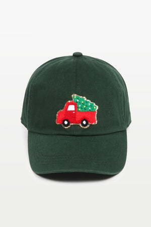 Baseball cap with a chenille patch depicting an adorned Christmas Tree in a Vintage Truck in dark green