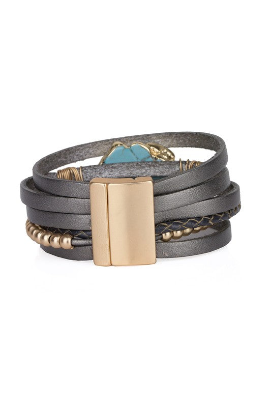 stackable leather wrapped bracelet with gold-tone beads and bar with a turquoise center piece and gold-tone magnetic clasp 