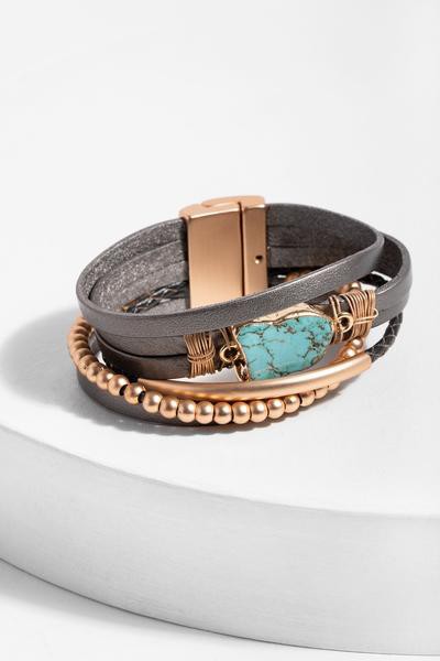 stackable leather wrapped bracelet with gold-tone beads and bar with a turquoise center piece and gold-tone magnetic clasp 