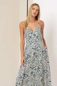 Maxi Dress in Abstract Navy and Beige Floral Print
V-Neckline
Invisible Side Zipper

Hidden Side Pockets
Adjustable Spaghetti Straps
Fully Lined