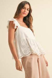 WHITE EYELET PEPLUM BOTTOM SLEEVELESS BLOUSE