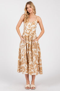 PATCH POCKET MIDI DRESS IN CREAM AND TAUPE GRAPHIC FLORAL PRINT WITH FUNCTIONAL FRONT BUTTONS AND ADJUSTABLE STRAPS