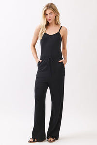 WIDE LEG JUMPSUIT (BLACK) W/ ELASTIC WAISTBAND AND TUNNEL TIE.  SOFT MODAL BLEND FABRIC IS STRETCHABLE.