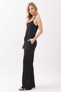 WIDE LEG JUMPSUIT (BLACK) W/ ELASTIC WAISTBAND AND TUNNEL TIE.  SOFT MODAL BLEND FABRIC IS STRETCHABLE.