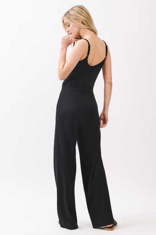 WIDE LEG JUMPSUIT (BLACK) W/ ELASTIC WAISTBAND AND TUNNEL TIE.  SOFT MODAL BLEND FABRIC IS STRETCHABLE.