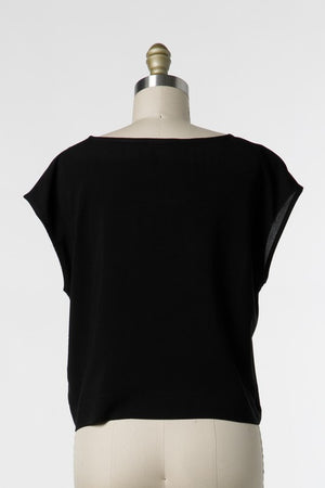 Woven Boxy Top with round neckline and short extended sleeves